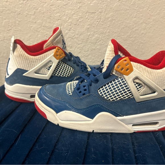 Jordan Sneakers in Blue, Red, and White with Orange Details